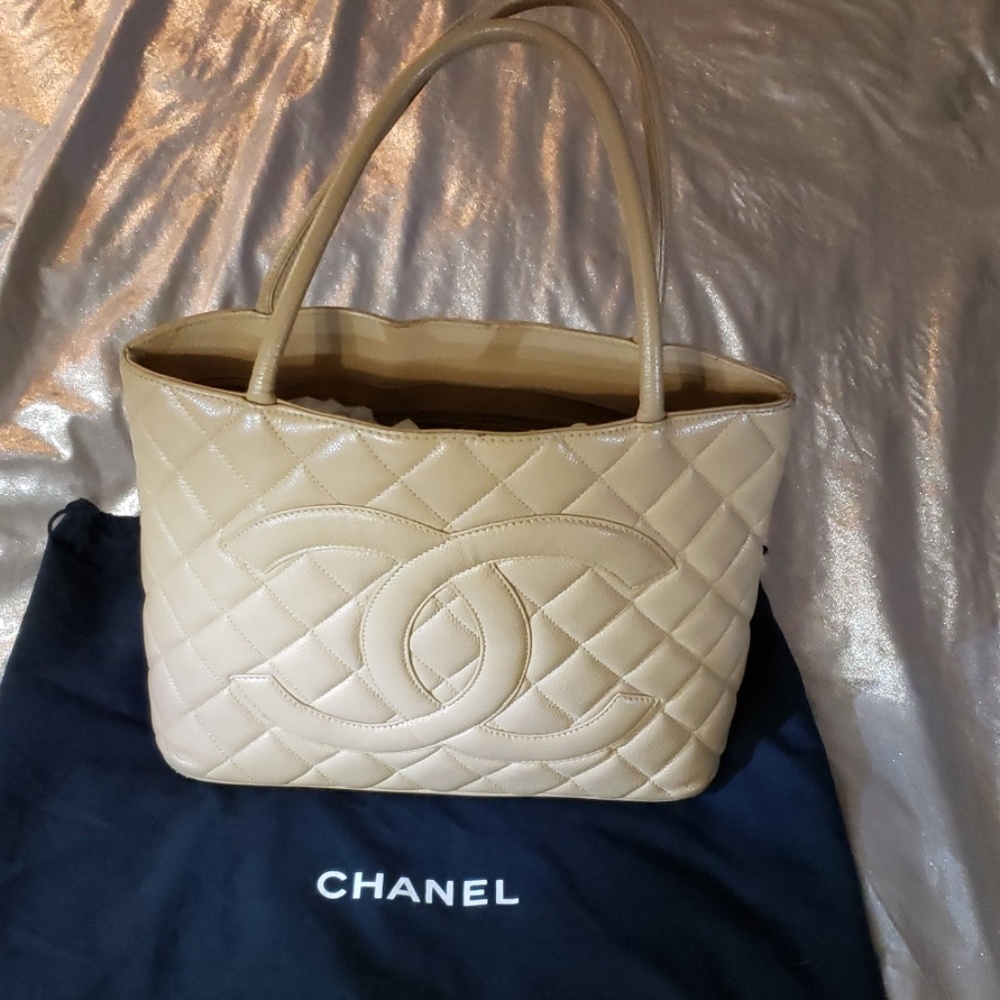 Chanel Gold Medallion Quilted Caviar Leather Bag